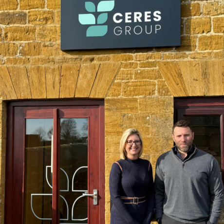 Image of Louise and Alex Jelley standing outside of the Ceres Group Northampton Office